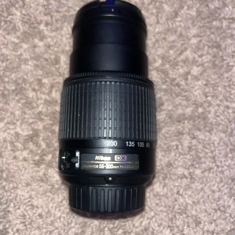 Nikon D3200 Camera. Includes Battery, 3 Nikon Lenses, Battery Charger, and Case.